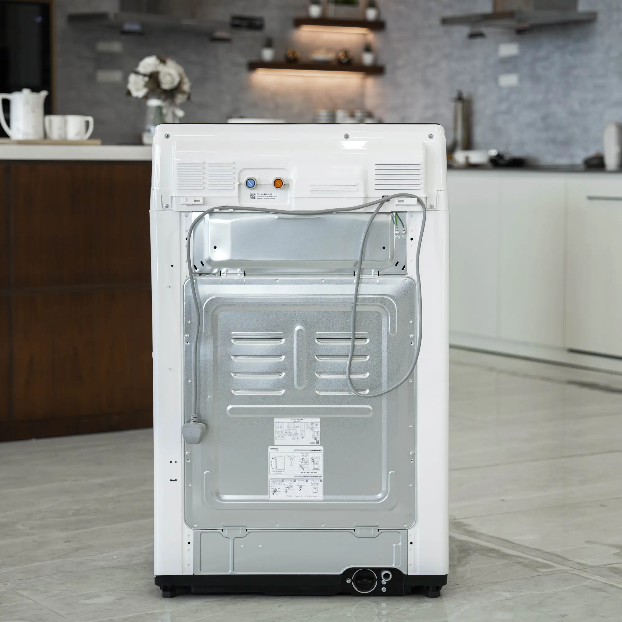Photo of غسالة ملابس إل جي فتحة علوية، سعة 21 كجم مع تقنيات AI DD و TurboWash  والتشخيص الذكي - لون ابیض.
