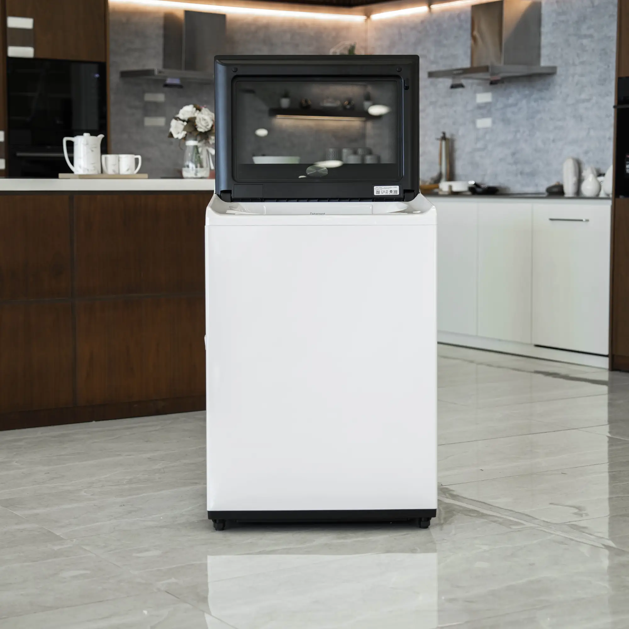 Photo of غسالة ملابس إل جي فتحة علوية، سعة 21 كجم مع تقنيات AI DD و TurboWash  والتشخيص الذكي - لون ابیض.