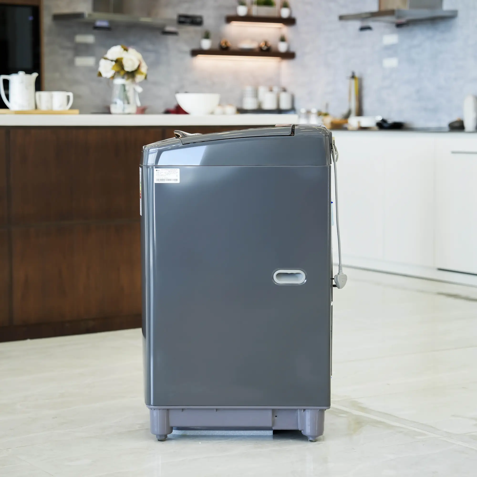 Photo of غسالة إل جي فتحة علوية، سعة 13kg، مزودة بتقنية Smart Inverter وTurboDrum™ - اسود