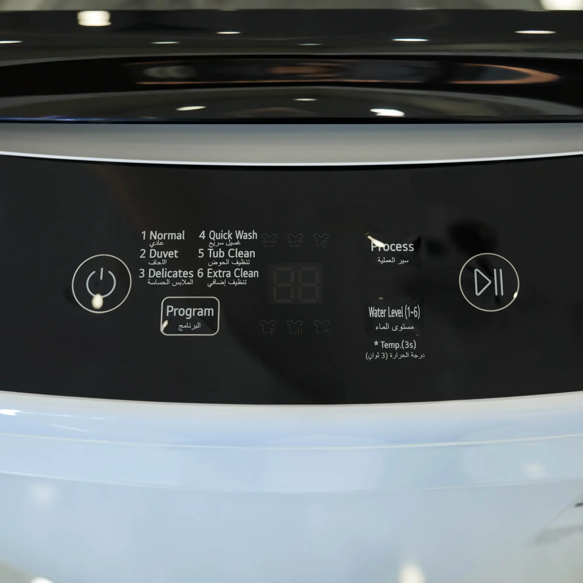 Photo of غسالة إل جي فتحة علوية، سعة 13kg، مزودة بتقنية Smart Inverter وTurboDrum™ - باللون الأبيض