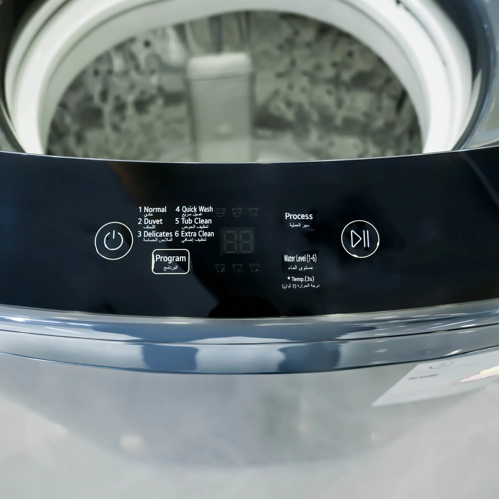 Photo of غسالة إل جي فتحة علوية، سعة 13kg، مزودة بتقنية Smart Inverter وTurboDrum™ - اسود