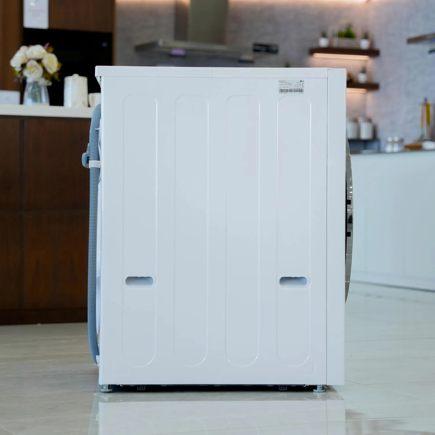 Photo of غسالة إل جي بسعة 20/10 كيلو، بتقنية AI DD™، البخار (Steam™)، و TurboWash™ 360، باللون الأبيض المميز