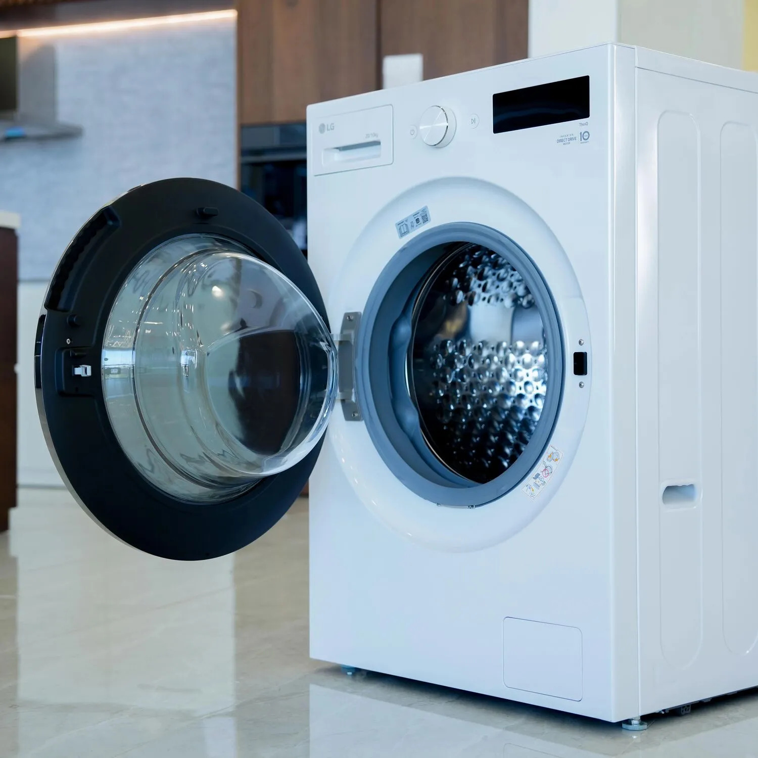 Photo of غسالة إل جي بسعة 20/10 كيلو، بتقنية AI DD™، البخار (Steam™)، و TurboWash™ 360، باللون الأبيض المميز