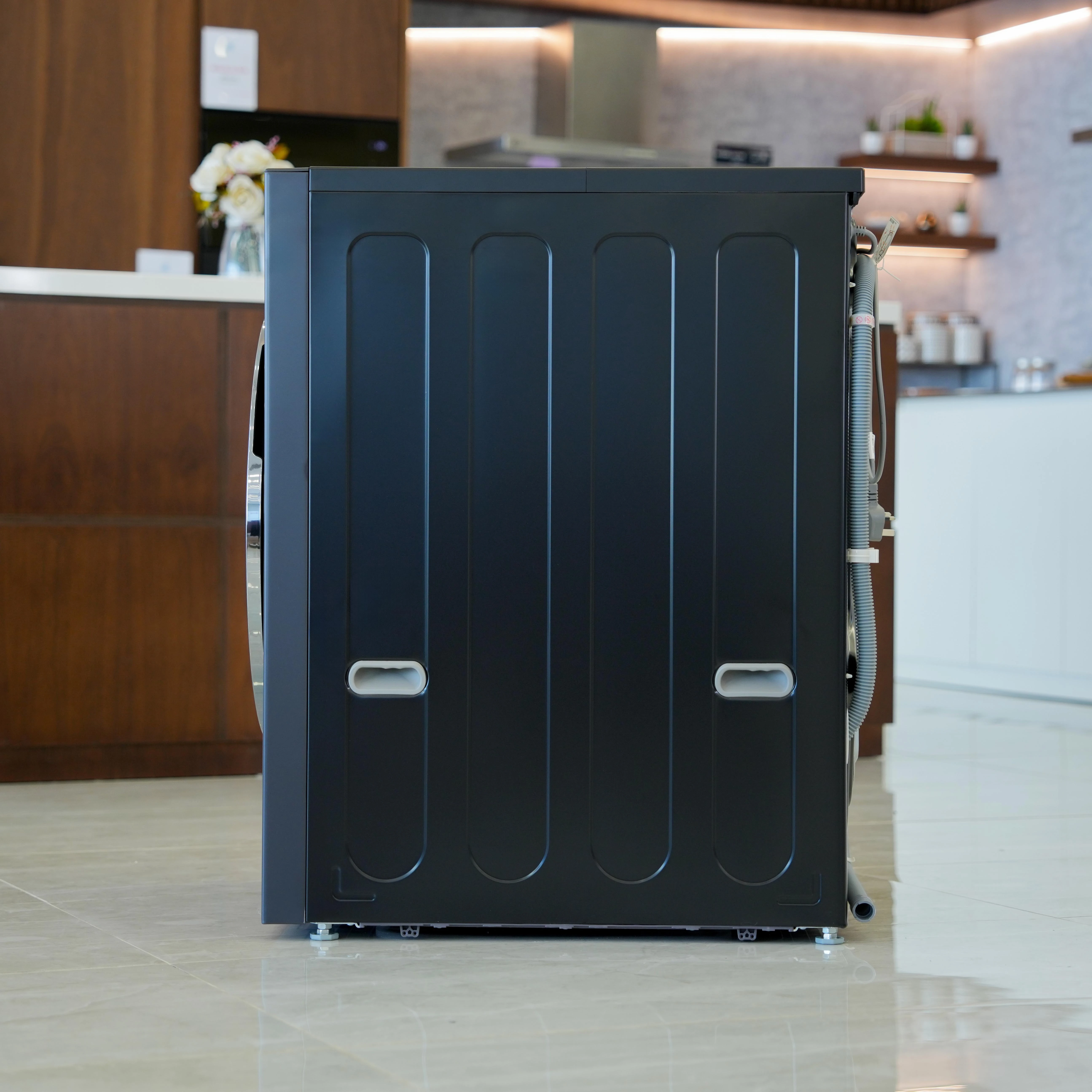 Photo of غسالة LG، سعة 18/10 كیلو، مع تقنية AI DD™، البخار (Steam™)، و TurboWash™ 360، لون رمادي جرافيتي