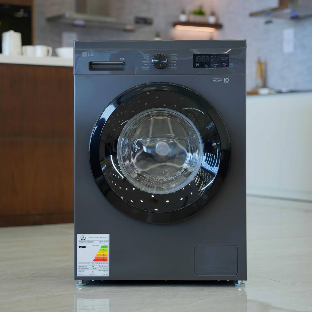 Photo of غسالة إل جي ذات التحميل الأمامي بسعة 8 كیلو، بتقنيات Direct Drive، والبخار، والتشخيص الذكي - باللون اسود متوسط.