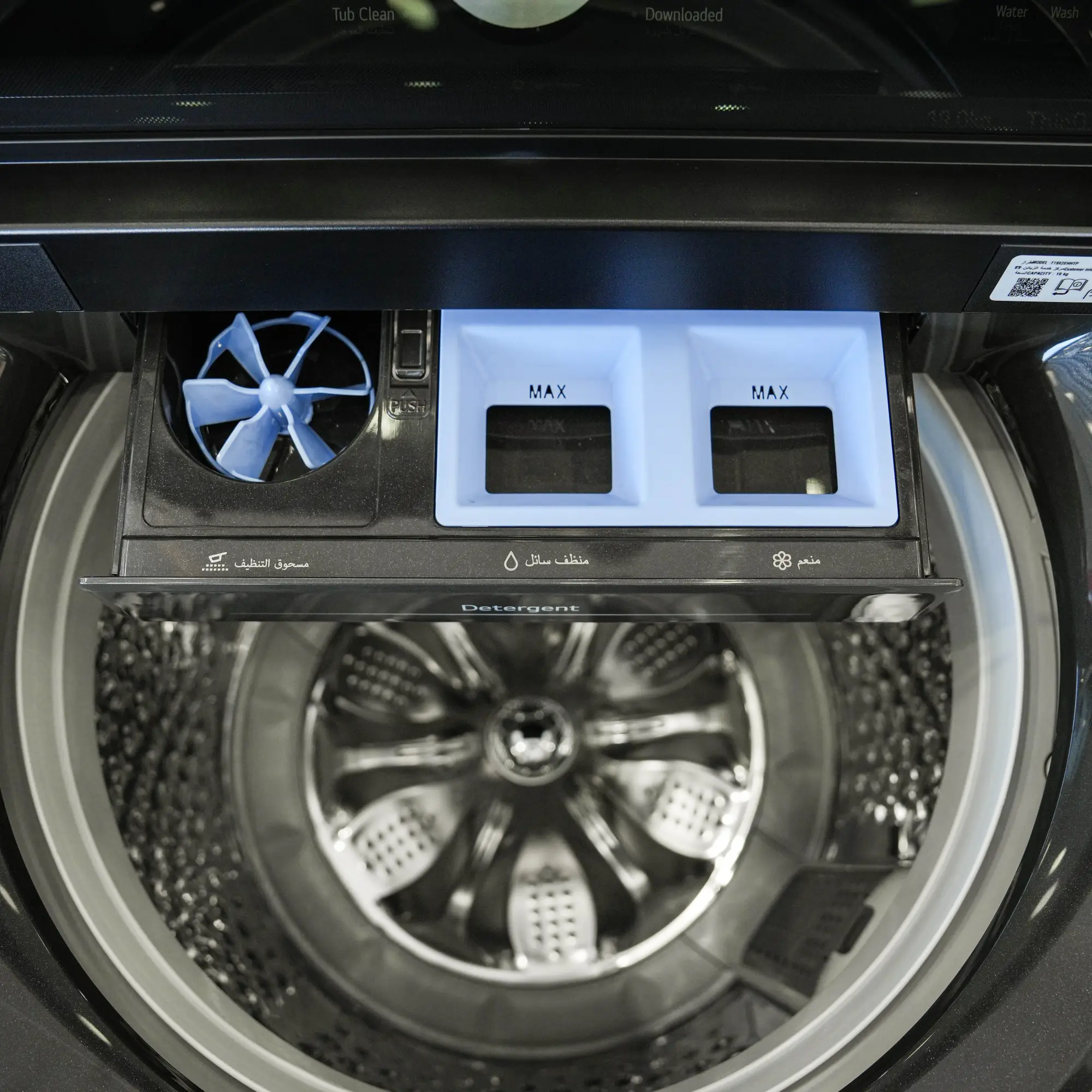 Photo of غسالة ملابس إل جي فتحة علوية، سعة 19 كجم مع تقنيات AI DD و TurboWash  والتشخيص الذكي - لون أسود معدني.