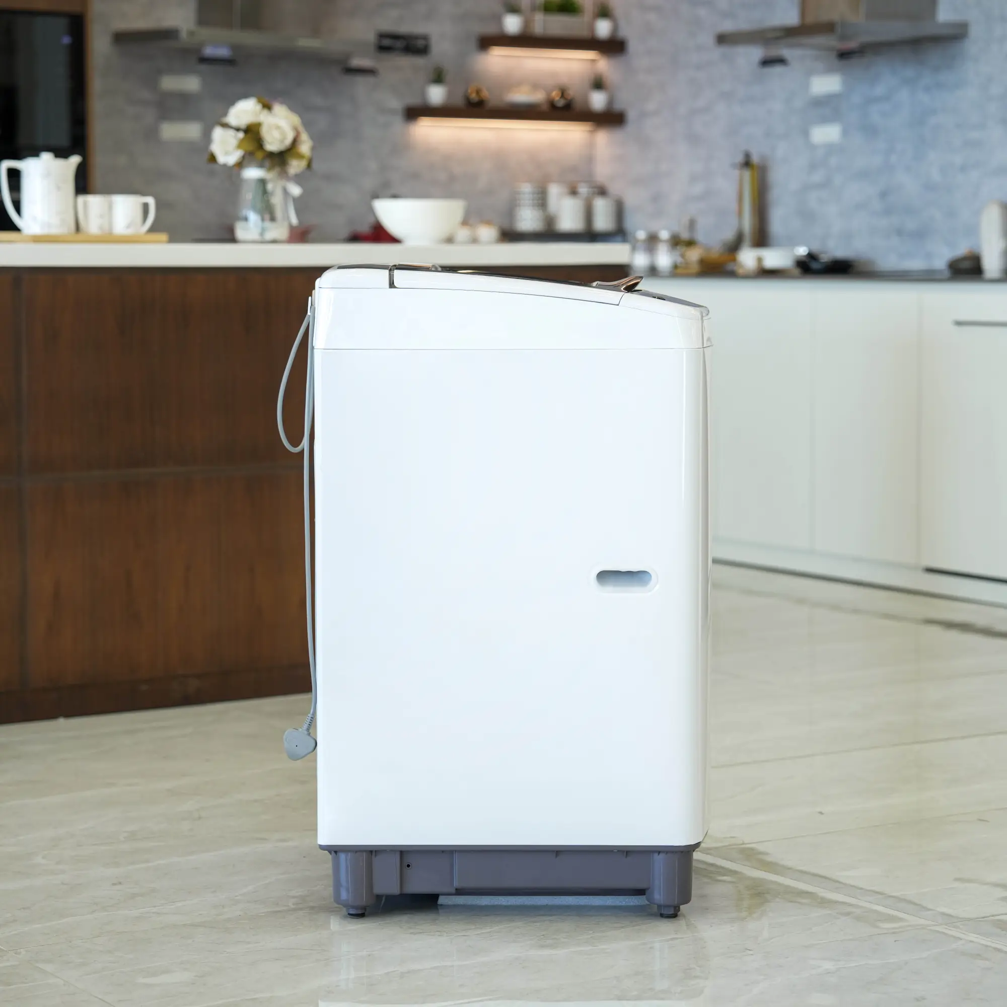 Photo of غسالة إل جي فتحة علوية، سعة 13kg، مزودة بتقنية Smart Inverter وTurboDrum™ - باللون الأبيض