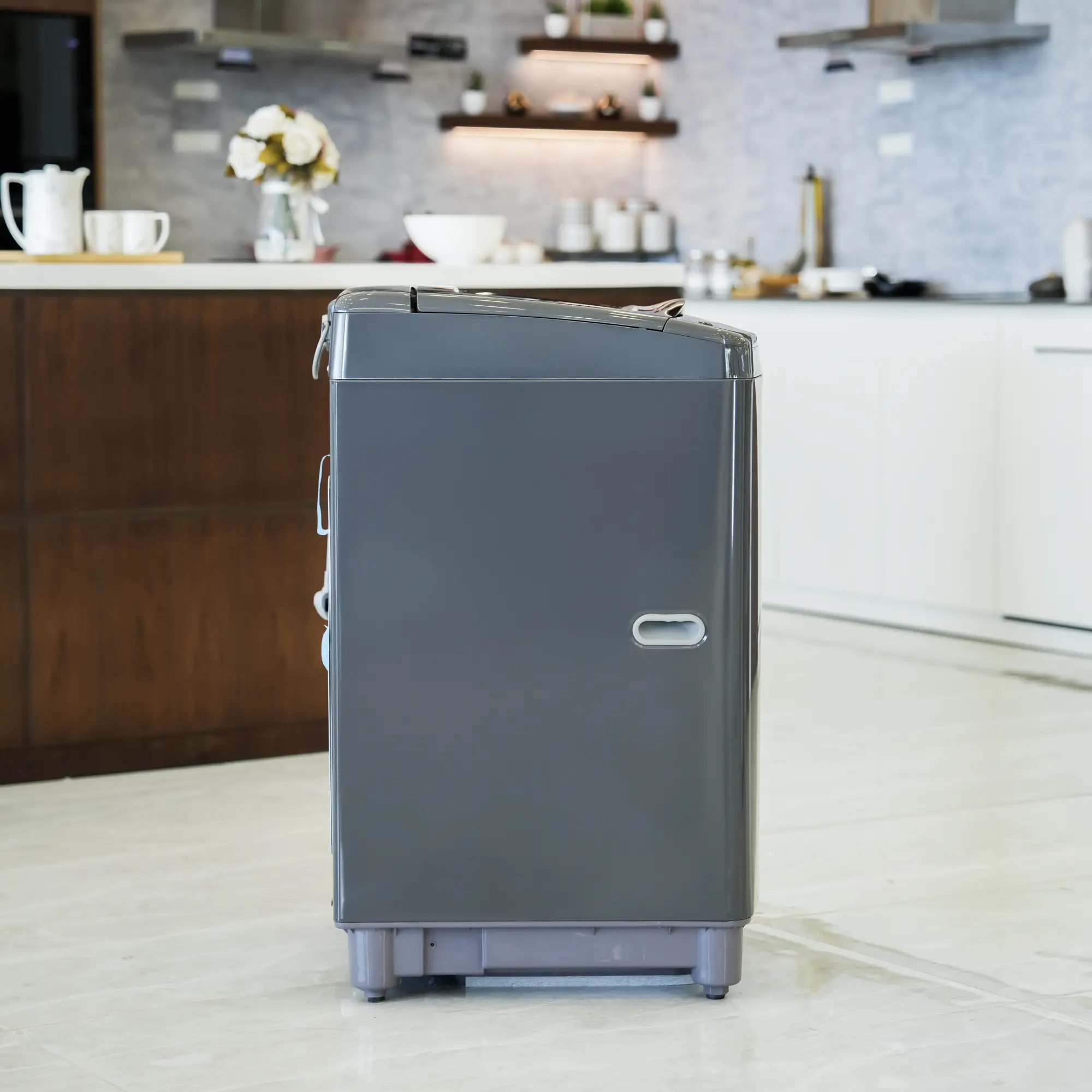 Photo of غسالة إل جي فتحة علوية، سعة 13kg، مزودة بتقنية Smart Inverter وTurboDrum™ - اسود