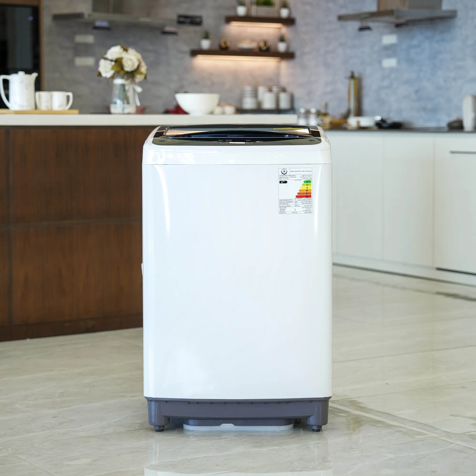 Photo of غسالة إل جي فتحة علوية، سعة 13kg، مزودة بتقنية Smart Inverter وTurboDrum™ - باللون الأبيض
