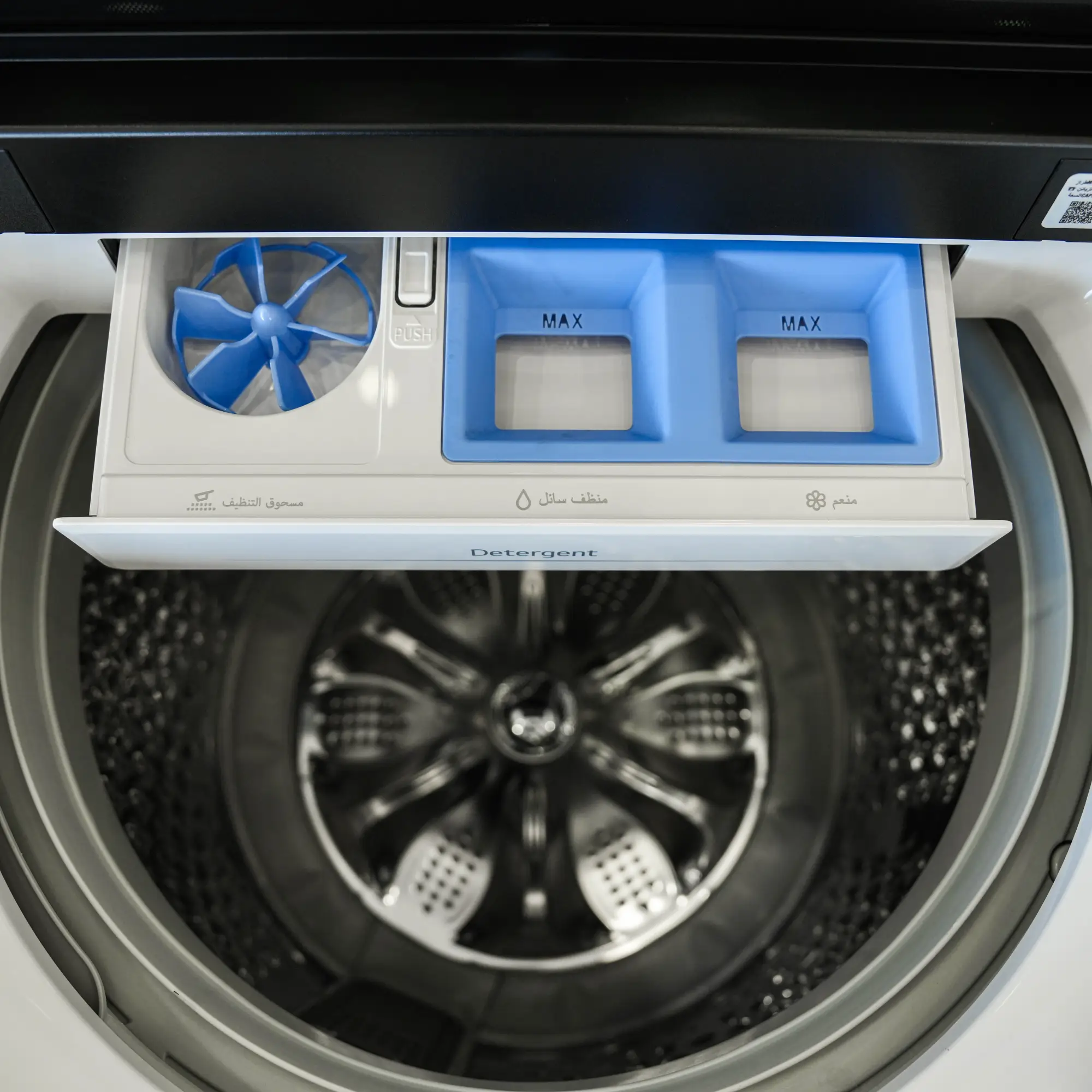 Photo of غسالة ملابس إل جي فتحة علوية، سعة 21 كجم مع تقنيات AI DD و TurboWash  والتشخيص الذكي - لون ابیض.