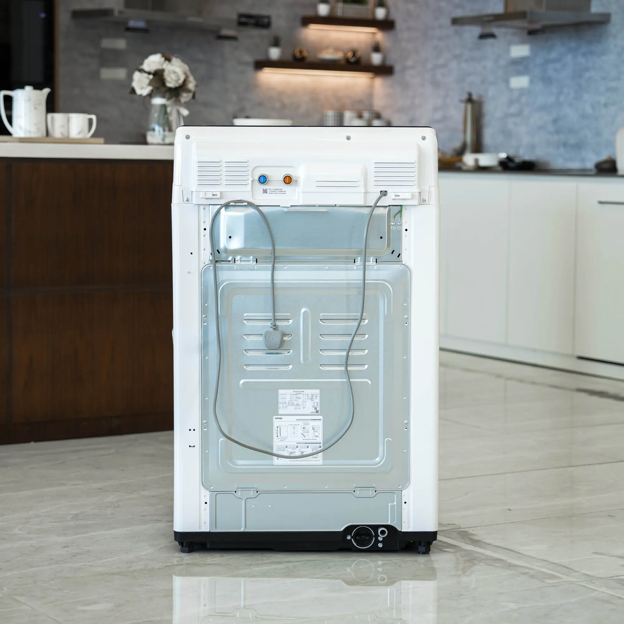 Photo of غسالة ملابس إل جي فتحة علوية، سعة 19 كجم مع تقنيات AI DD و TurboWash  والتشخيص الذكي - لون ابیض.