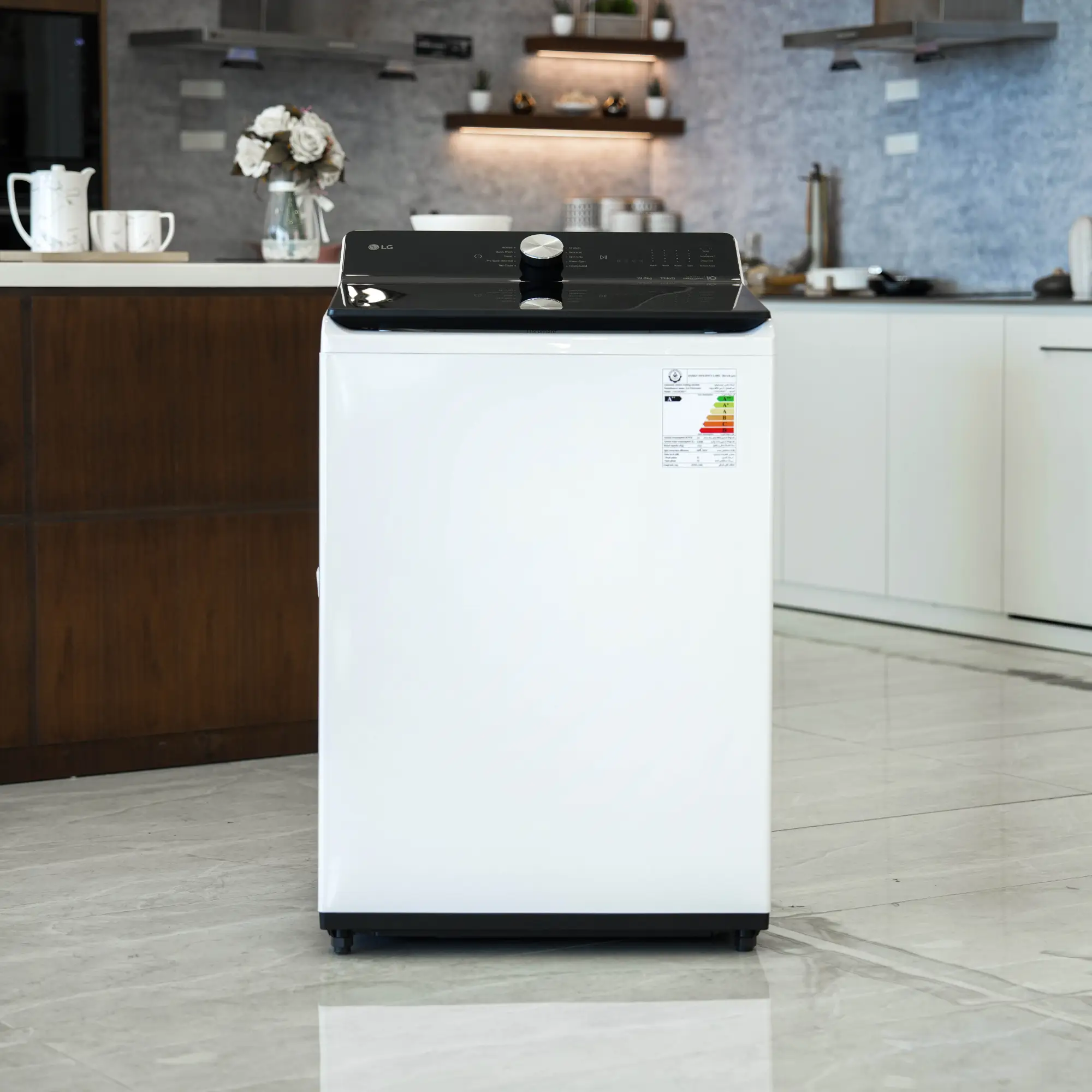 Photo of غسالة ملابس إل جي فتحة علوية، سعة 19 كجم مع تقنيات AI DD و TurboWash  والتشخيص الذكي - لون ابیض.